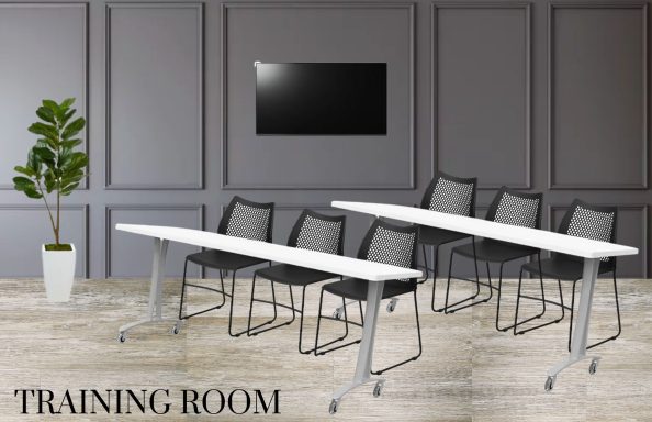 Training room with white tables, black chairs, and a TV on the wall.